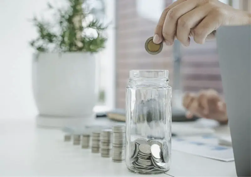 saving coins in jar
